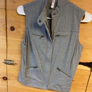 Gray vest; target